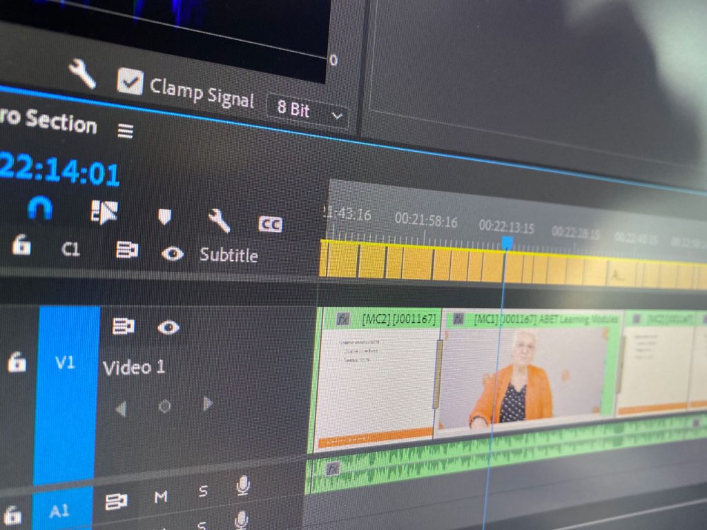 A closeup view of Premier Pro focusing on the caption track to increase video accessibility.